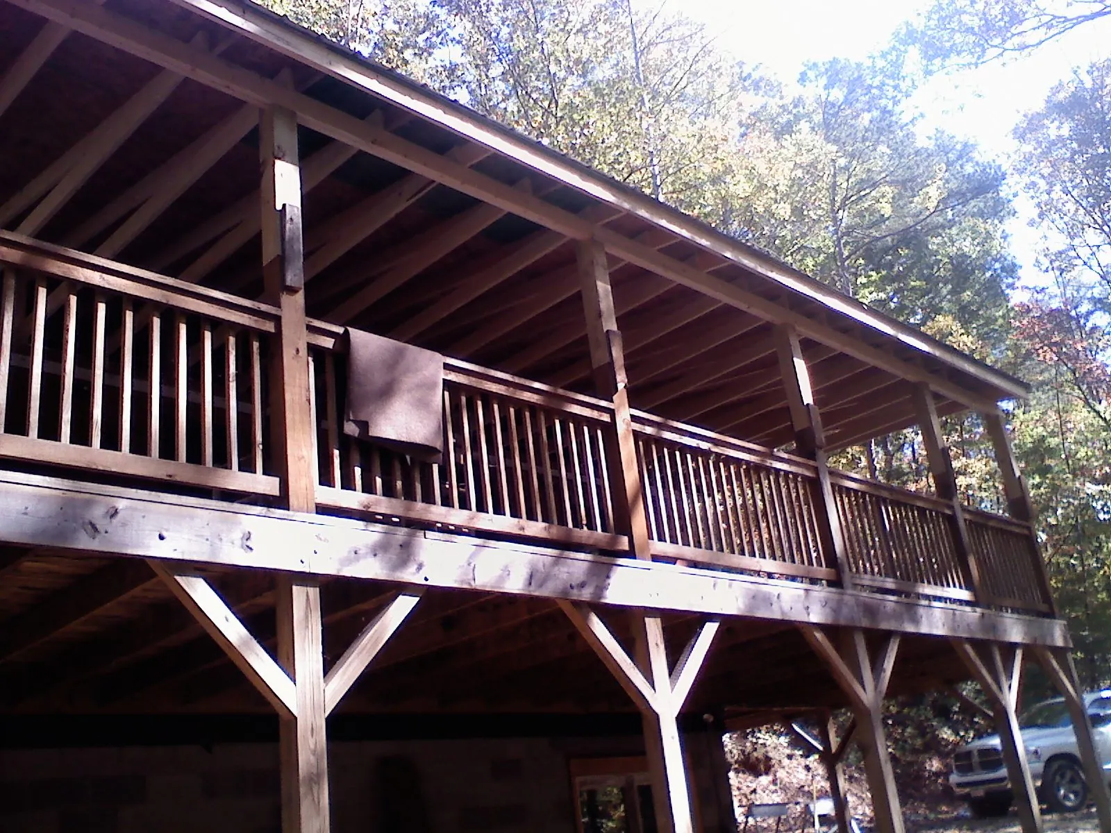 Timber framing under a new elevated porch and deck — Roof Leak Repair in Ramseur by Roofing Brothers